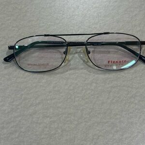 Flexure Memory Titanium Glasses